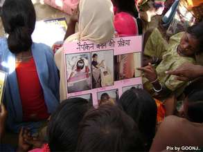 Women looking at the process to make pads!