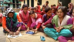 Women learning to make 'MY Pad'
