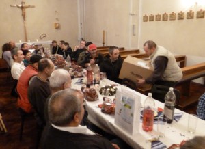 Distributing Christmas presents at the shelter