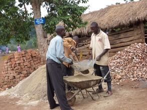 sieving the sand before mixing with cement