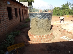 Wire meshing the wood form and plastering