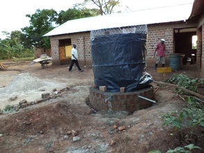 Covering after plastering to allow cement to sure