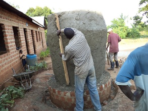 Plastering the tank outside