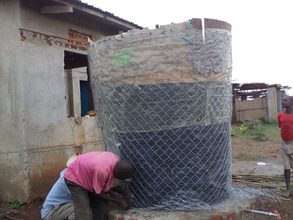 Wire meshing the wood form before plastering