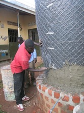 Plastering the wire meshed wood form