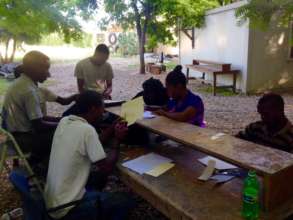 Jean Robert conducts daily training