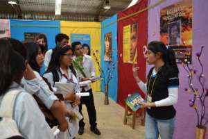 A volunteer presenting the poster