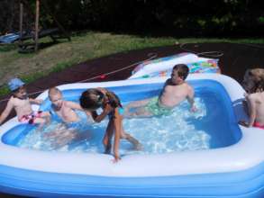 In the pool with other kids