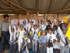 Children delighted to have received the school kit