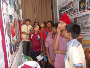 Children learning about the work of Goonj