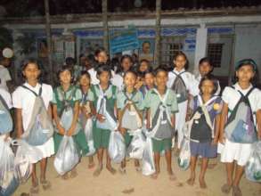Children happy to use the school kit.