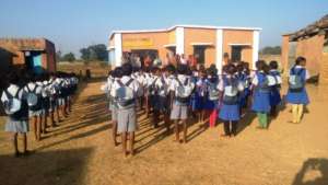 Children with their school kits