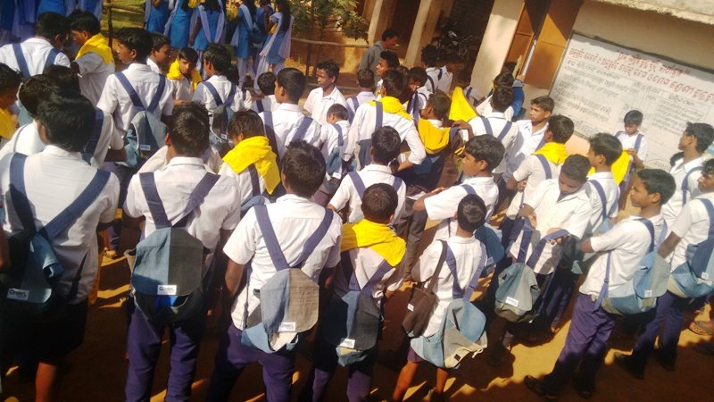 Showing off school kits...