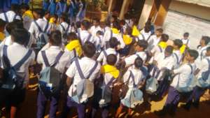 Showing off school kits...