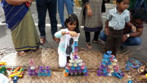A child building the tower blocks