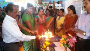 Dignitaries light the traditional lamp