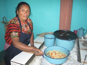 Dona Andrea cooking for the students
