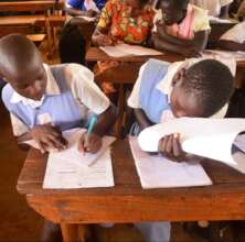 Girls of Makonkonyigo working out a monthly budget