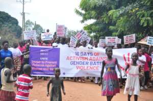Match through the village campaigning against GBV