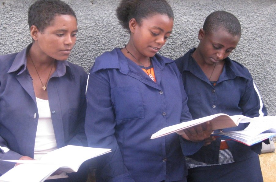 Girls reading together
