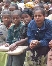 Girls attend a mentoring session at their school.