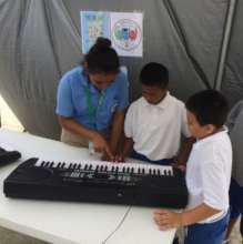 High-school music students teach younger children
