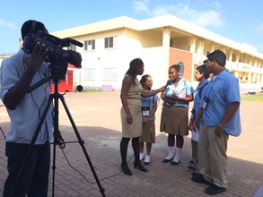National news coverage of Hire Belize team