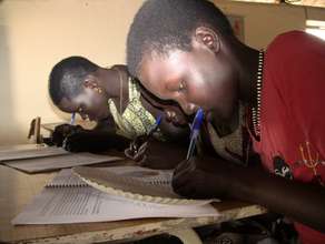 Girls making Monthly Menstrual Calendars