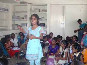 Nathiya participating in a competition