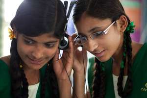 Manisha (right), topped 12th grade with 74.4%