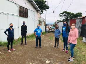 Alejandra with other volunteers doing walkthroughs