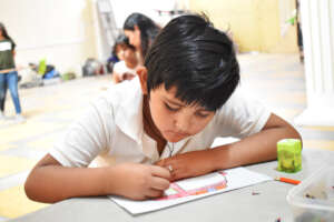 Child from seventh generation in learning session