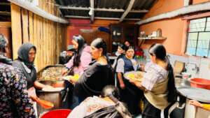Preparing the community feast in Ecuador