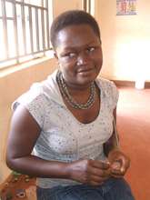 A survivor with her handmade jewelry
