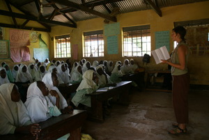 The teen girls listening intently to their lesson.