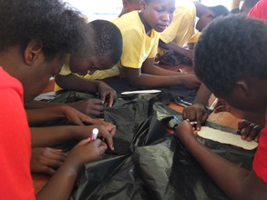 Learning how to make reusable menstrual pads.
