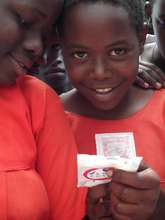 Teen girl learns about female condoms