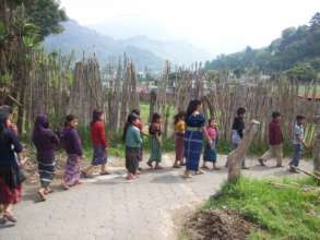 Children and teachers hiking in Guatemala