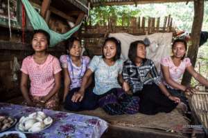 Thandar with peers in her village, circa 2013