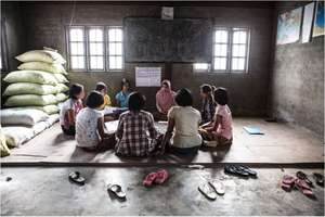 Girls work in their circle on peer communication