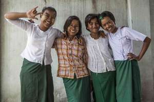 Girl Determined participants having fun- together.