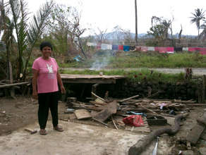 Filipino families rebuild homes after typhoon