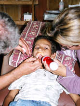 Dentist exam by flashlight