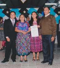 Adela with her Parents and the School Director
