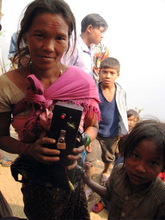 Holding "Mero Bakas", the rechargeable battery