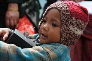 Village child carries home the first UserBox