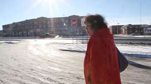 Joyce walking to work at the mental health clinic