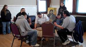 Native men at drumming ceremony