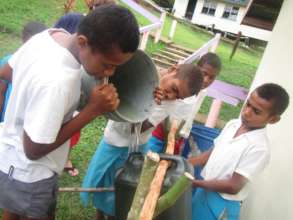 Filling up the Tippy Tap for use