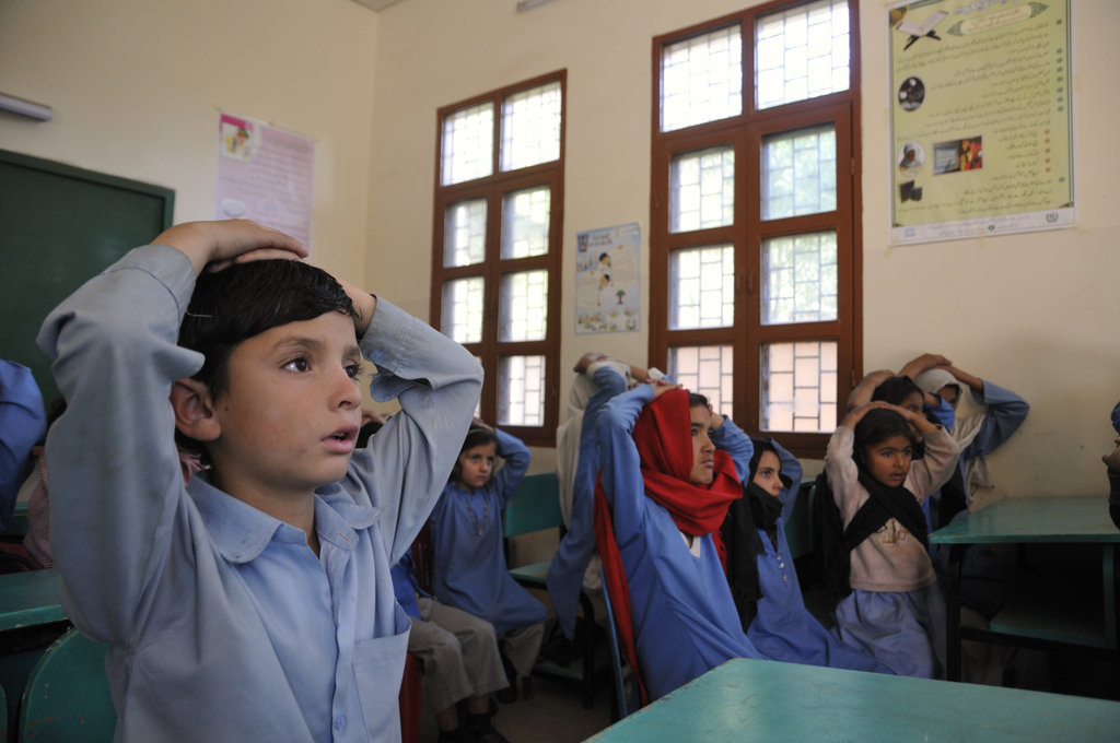 Adeel learning about how to stay earthquake-safe